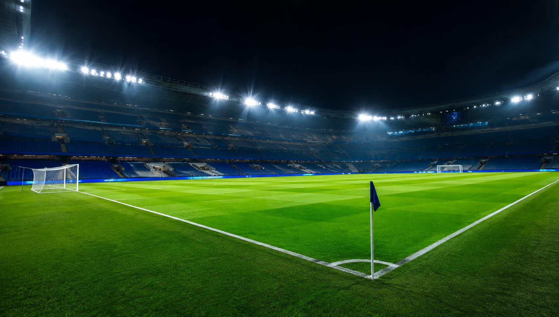 Corner flag beneath the floodlights of a football stadium